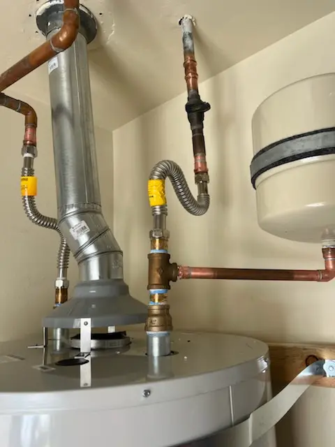 Water heater installation and plumbing repair in Coachman
